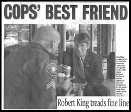 [Robert King is _Cops' Best Friend_ in the Tribune]